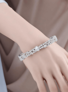 Woman's hand showcasing diamond bracelet